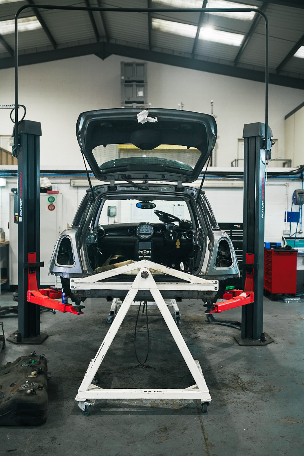 stripped down R56 MINI ready to be painted a custom colour.