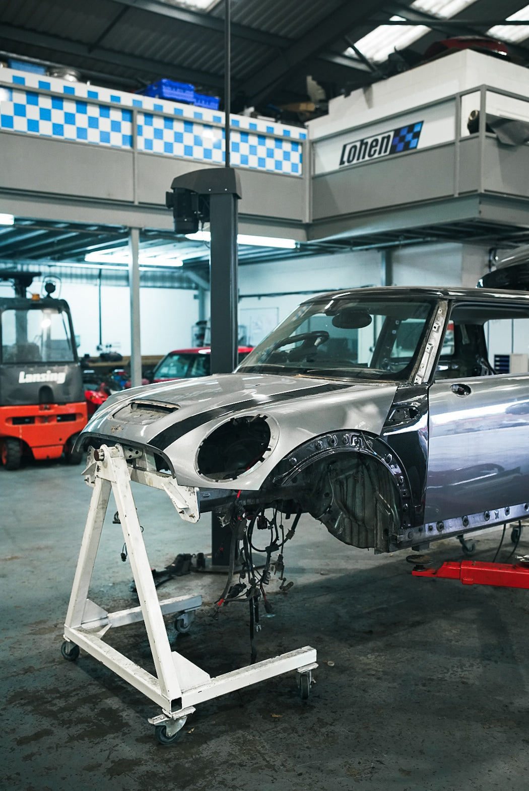 MINI R56 stripped down with engine removed in preparation for repainting a custom colour.
